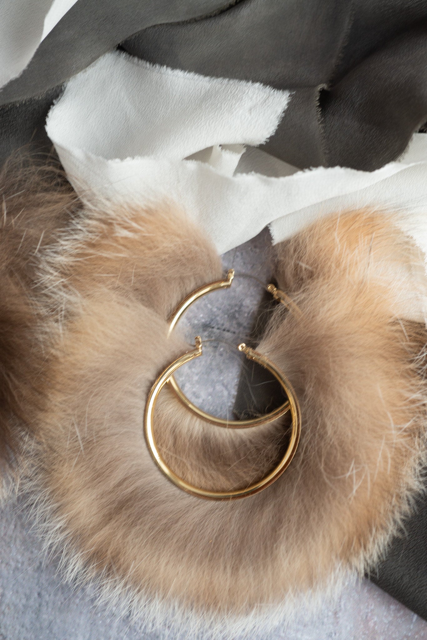 Giant gold hoop earrings top